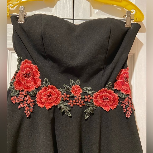 Beautiful Flirty Flounce Hemline Strapless Dress by Rob & Ali - Picture 2 of 9